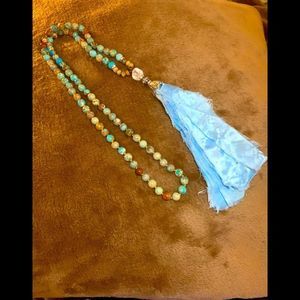 Long tassel bead necklace